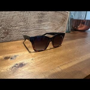 Quay After Hours - tortoise and black lens